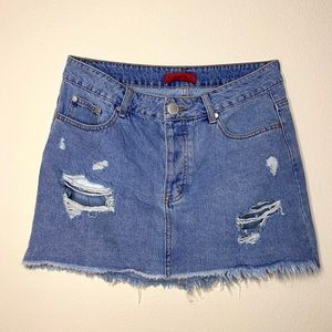 Distressed denim mini skirt
